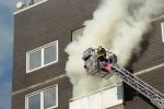 Flammen am Hochhaus